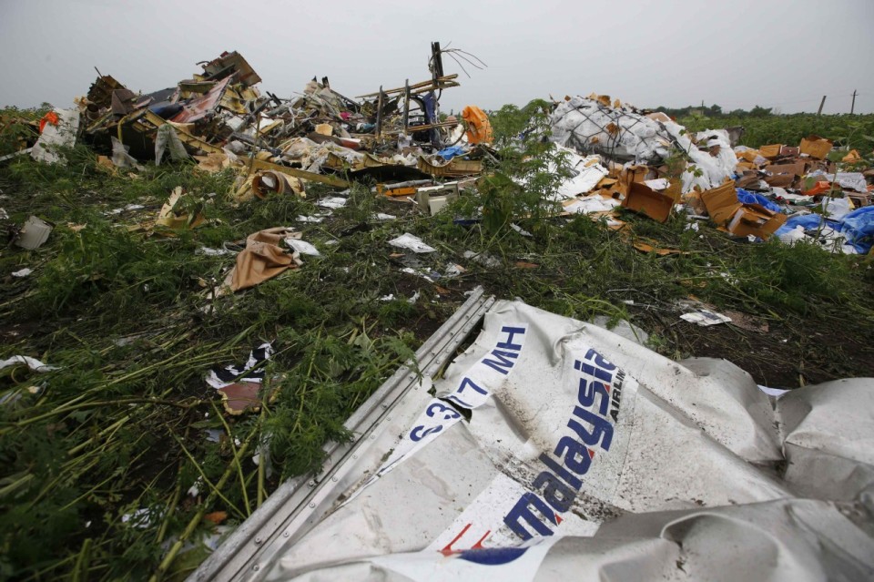 Wreckage from the nose section of a Malaysian Airlines Boeing 777 plane which was downed on Thursday is seen near the village of Rozsypne